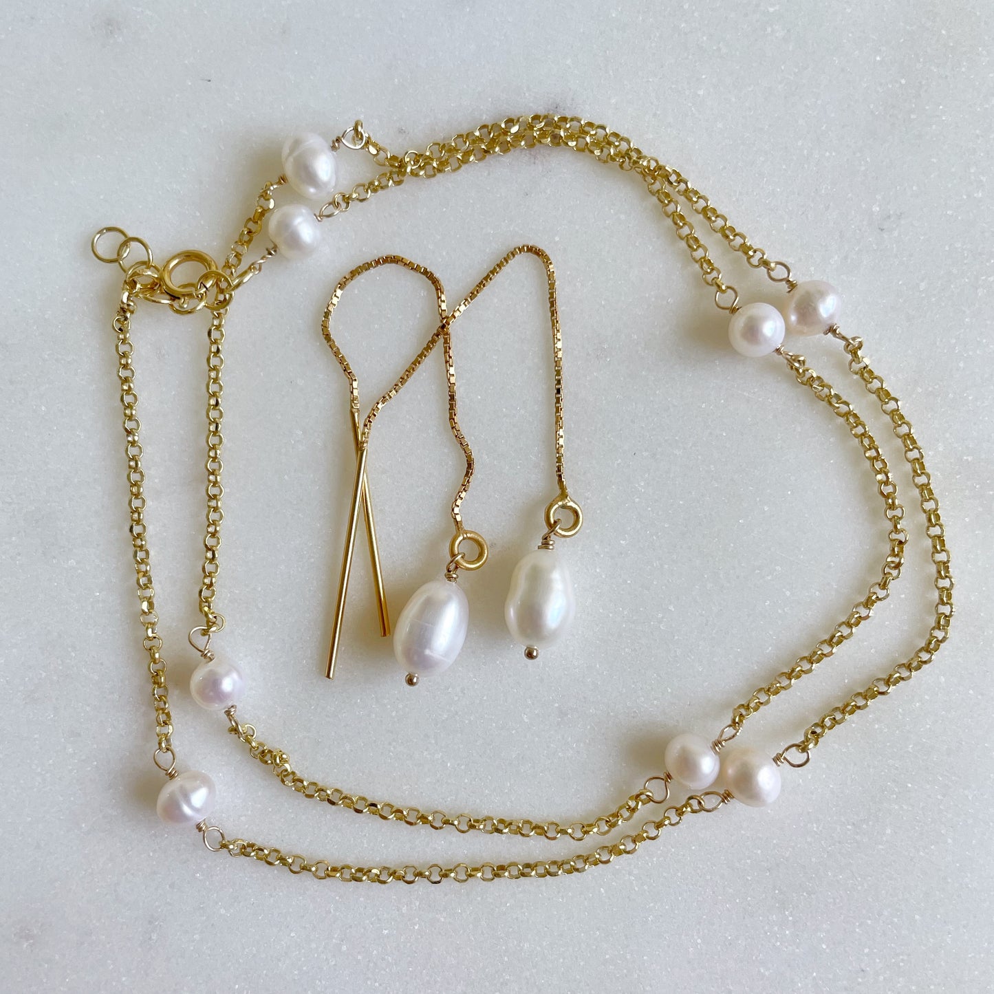 Manika Pearl thread earrings