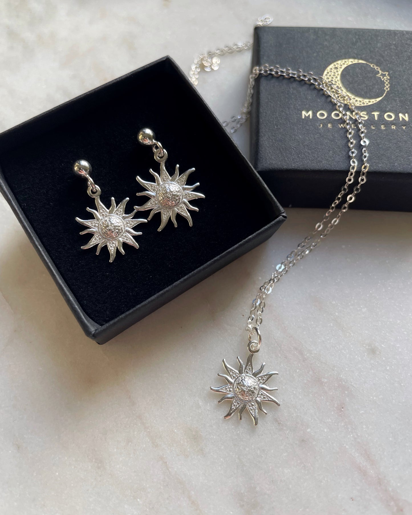Sun studs earrings